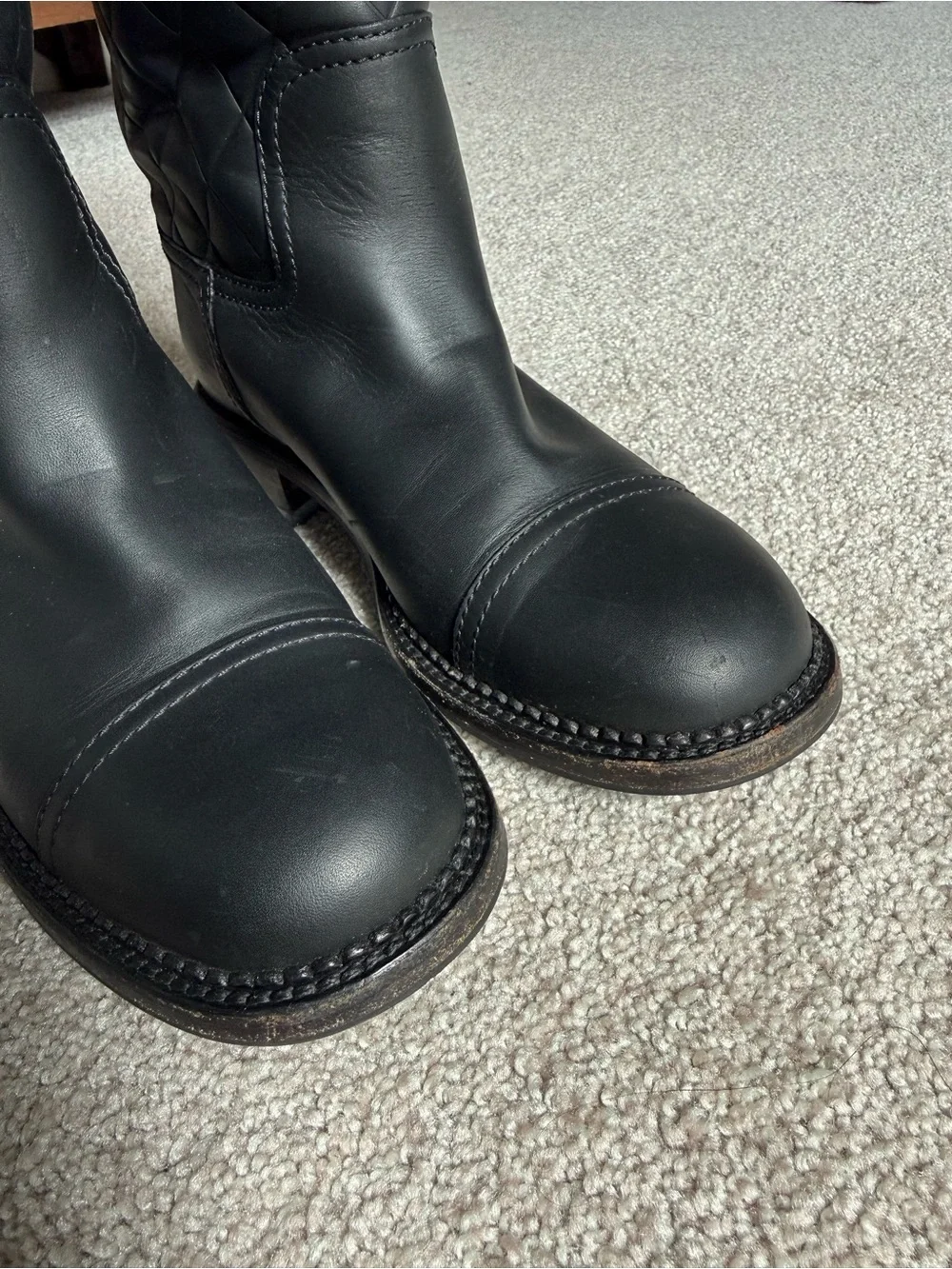 Chanel Quilted Leather Knee-High Riding Boots in Black